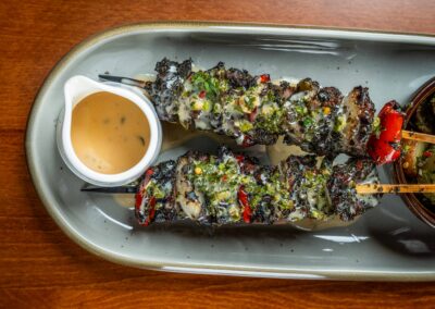 Grilled beef skewers with Mediterranean spices, served at Slowly Mediterranean fusion restaurant in Pacific Beach